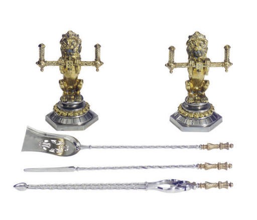 A SET OF THREE VICTORIAN ORMOLU AND STEEL FIRE TOOLS,