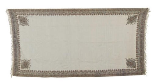 A SHAWL OF IVORY WOOL AND EMBROIDERED BORDERS,
