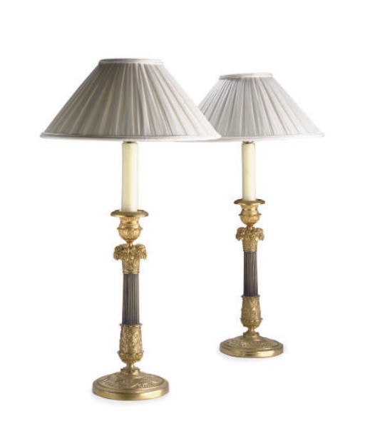 A PAIR OF CHARLES X ORMOLU AND PATINATED-BRONZE LAMPS