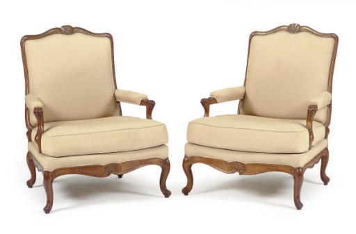 A PAIR OF LOUIS XV PROVINCIAL WALNUT AND CHESTNUT FAUTEUILS,