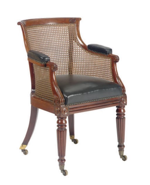 A REGENCY MAHOGANY AND CANED ARMCHAIR,
