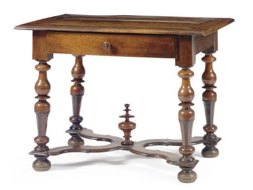 A NORTH EUROPEAN WALNUT CENTER TABLE,