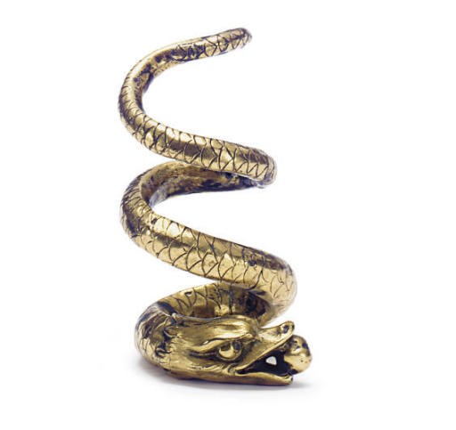 A CONTINENTAL GILT-BRONZE FIGURAL MOUNT OF A COILED SERPENT,
