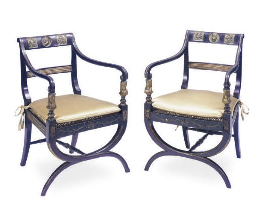 A PAIR OF ENGLISH BLACK-PAINTED AND PARCEL-GILT ARMCHAIRS