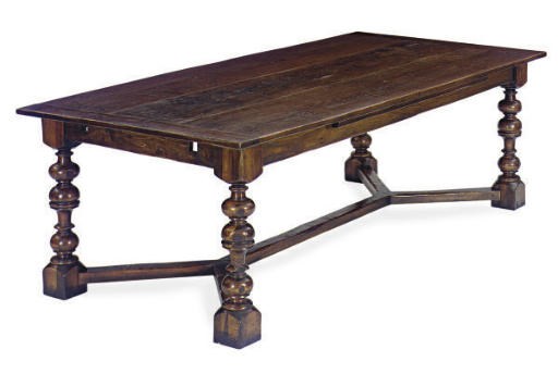 AN ENGLISH CHESTNUT DRAW-LEAF DINING TABLE,