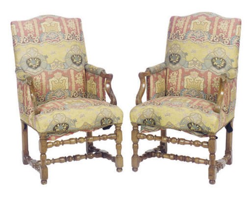A PAIR OF CONTINENTAL BEECHWOOD AND WALNUT BERGERES,