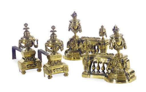 A PAIR OF BRASS ANDIRONS AND FIRE GUARDS,