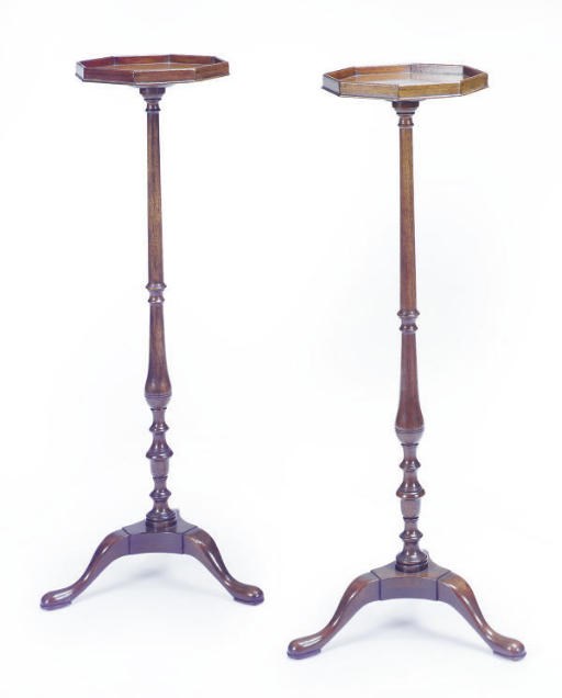 A PAIR OF MAHOGANY PLANT STANDS,