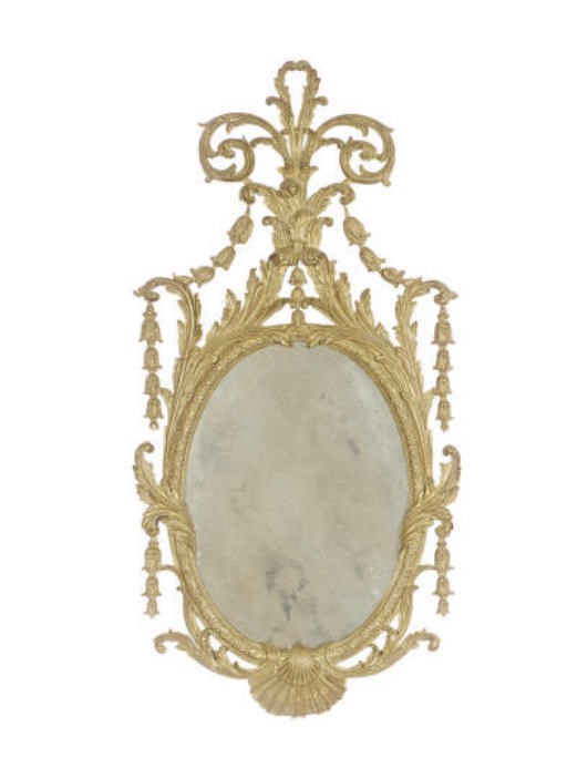 A GILTWOOD OVAL WALL MIRROR,