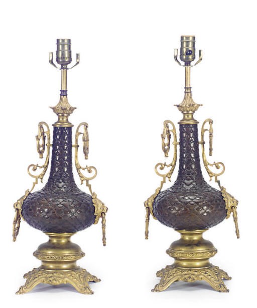 A PAIR OF PATINATED AND GILT-BRONZE TABLE LAMPS,
