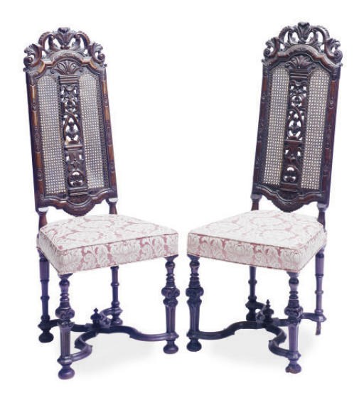 A PAIR OF WALNUT AND CANED SIDE CHAIRS,