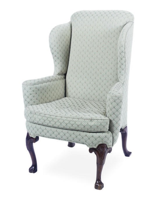 A MAHOGANY AND UPHOLSTERED WINGBACK ARMCHAIR,
