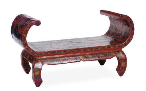 A CHINESE POLYCHROMED RED LACQUER LOW BENCH,