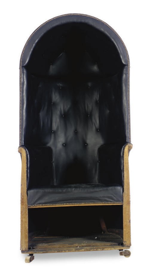AN ENGLISH LEATHER UPHOLSTERED PORTER'S CHAIR,