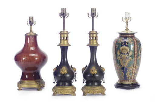 A PAIR OF PATINATED AND GILT-BRONZE TABLE LAMPS,