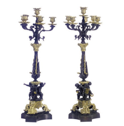 A PAIR OF NAPOLEON III PATINATED AND GILT-BRONZE SIX-LIGHT CANDELABRA,