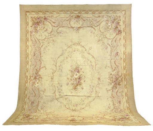 AN AUBUSSON CARPET,