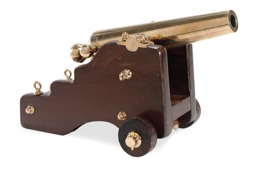 A small brass signal cannon