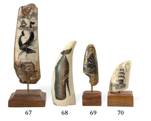 A scrimshaw whale's tooth depicting a whale**