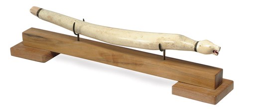 A native North American ceremonial bear club**