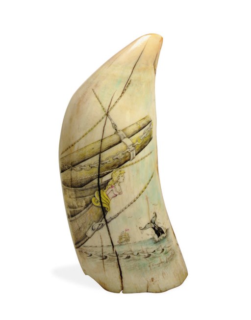 A large 20th century scrimshaw whale's tooth with the bow of a ship**