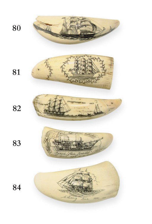 A 20th century scrimshaw whale's tooth with a ship**