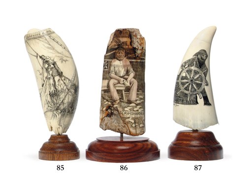 A 20th century scrimshaw whale's tooth of a captain "at the helm"**