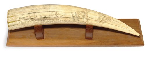 A 19th century scrimshaw walrus' tusk The Perils of Whalermen**