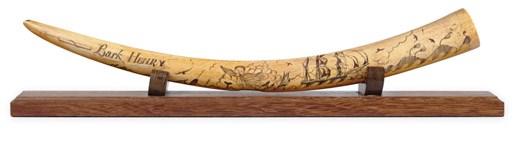 A late 19th or early 20th century scrimshaw walrus' tusk of the bark Henry**