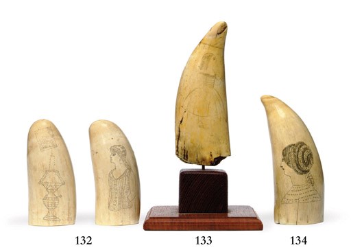A 19th century scrimshaw whale's tooth**