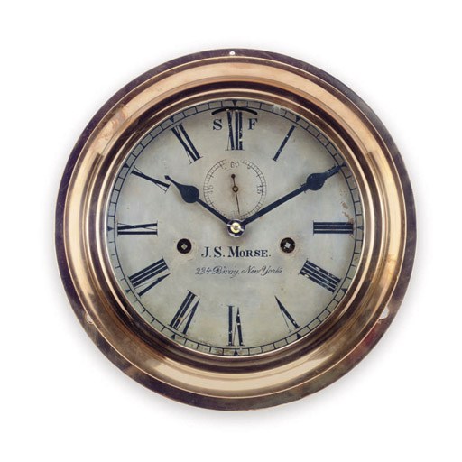 A 19th century American ship's strike bulkhead clock
