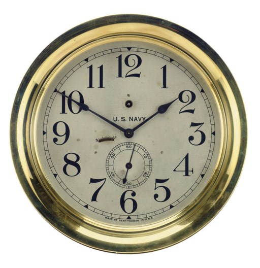 An early 20th century American U.S. Navy bulkhead clock