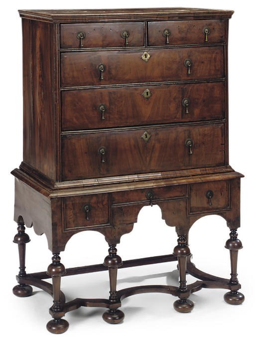 A WALNUT CHEST ON STAND