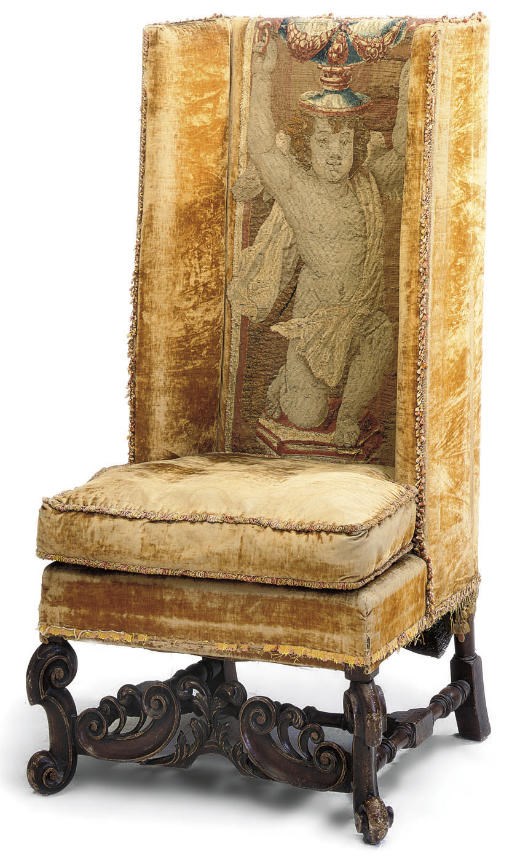 A BROWN PAINTED GOLD VELVET AND TAPESTRY UPHOLSTERED WING ARMCHAIR