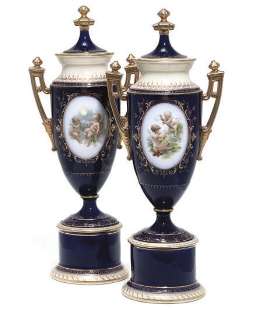 A PAIR OF GERMAN PORCELAIN DARK-BLUE-GROUND VASES AND COVERS