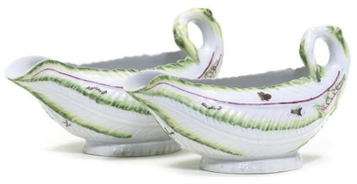 A PAIR OF WORCESTER COS LETTUCE LEAF-MOULDED SAUCEBOATS