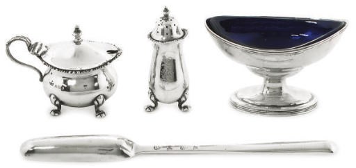 A GEORGE III SILVER BOAT-SHAPED SALT CELLAR