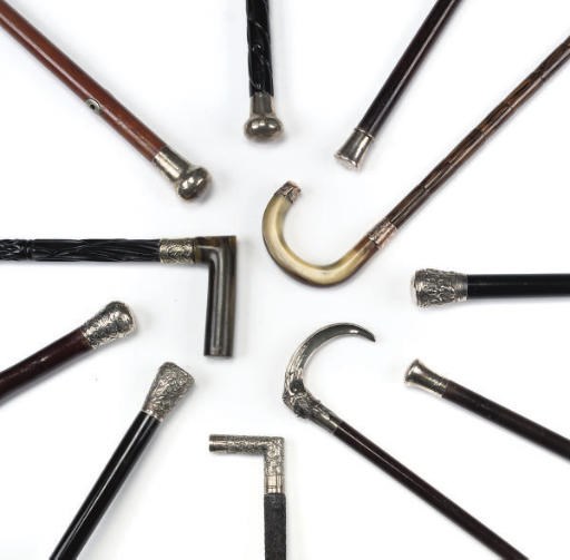 A GROUP OF SILVER MOUNTED WALKING CANES