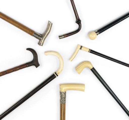 A GROUP OF EIGHT VICTORIAN AND EDWARDIAN IVORY AND SILVER MOUNTED WALKING STICKS