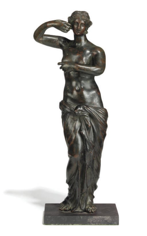 AN ITALIAN BRONZE FIGURE OF A CLASSICAL MAIDEN
