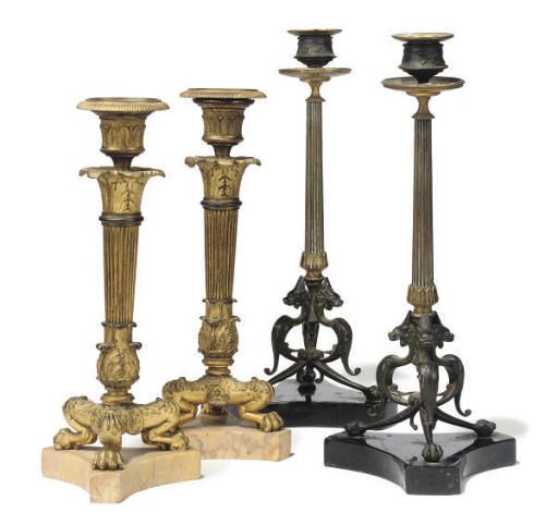 A PAIR OF RESTAURATION GILT-BRONZE CANDLESTICKS
