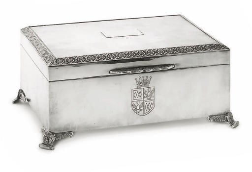 A SILVER CASKET-FORM CIGARETTE BOX