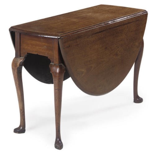 A GEORGE III MAHOGANY DROP LEAF TABLE