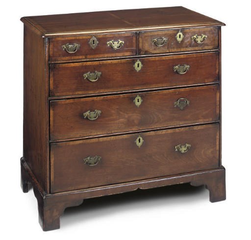 A WALNUT AND CROSSBANDED CHEST