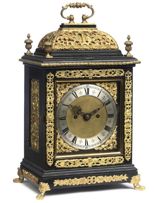 A Victorian brass-mounted ebonised striking eight day table clock