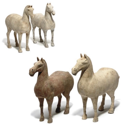 Four Chinese red and black pottery models of horses
