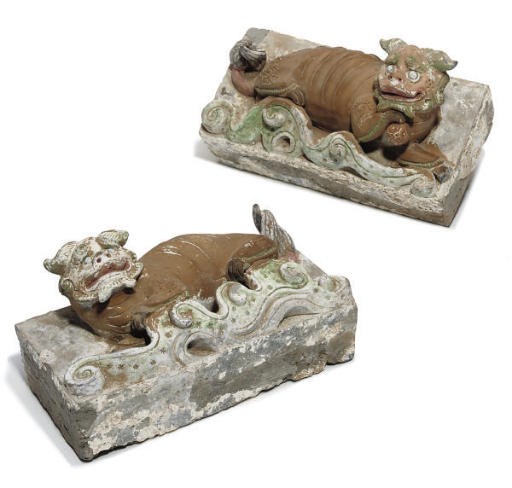 A pair of Chinese painted stoneware tiles