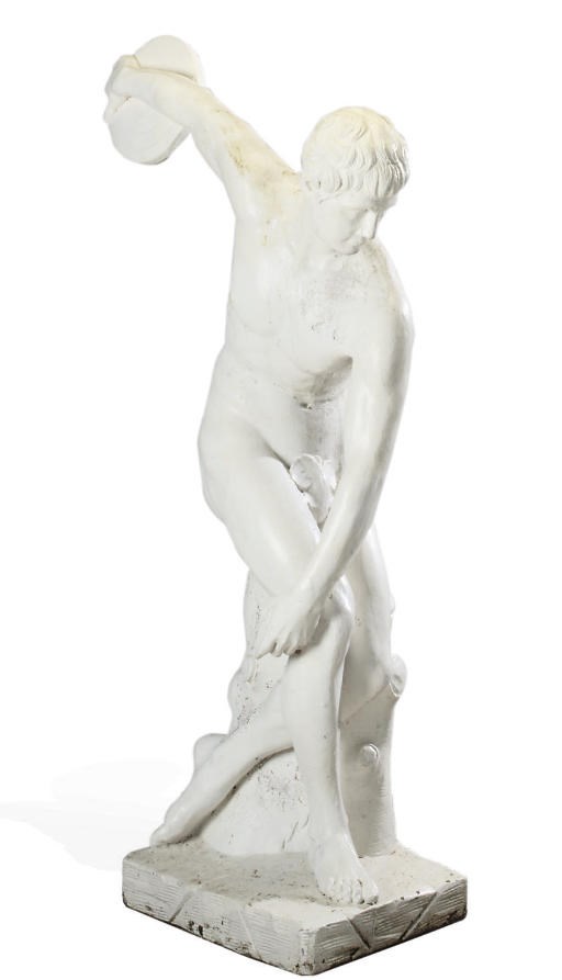 A PAINTED STONE FIGURE OF DISCOBOLUS