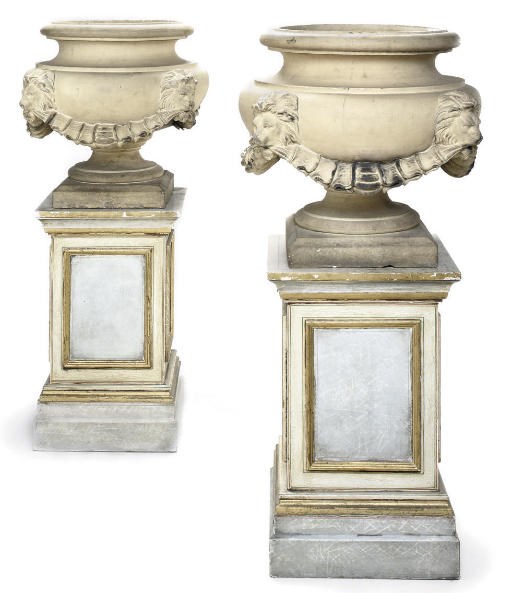 A PAIR OF ENGLISH TERRACOTTA URNS
