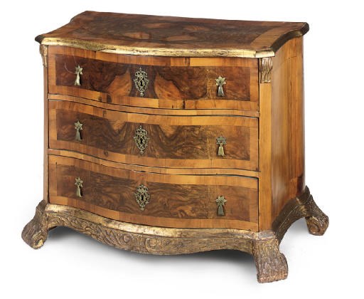 A GERMAN WALNUT, BURR AND PARCEL GILT SERPENTINE COMMODE